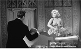 yves montand and marylin monroe on set lets make love 1959