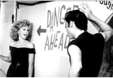 Olivia newton john and John travolta on set grease 1977